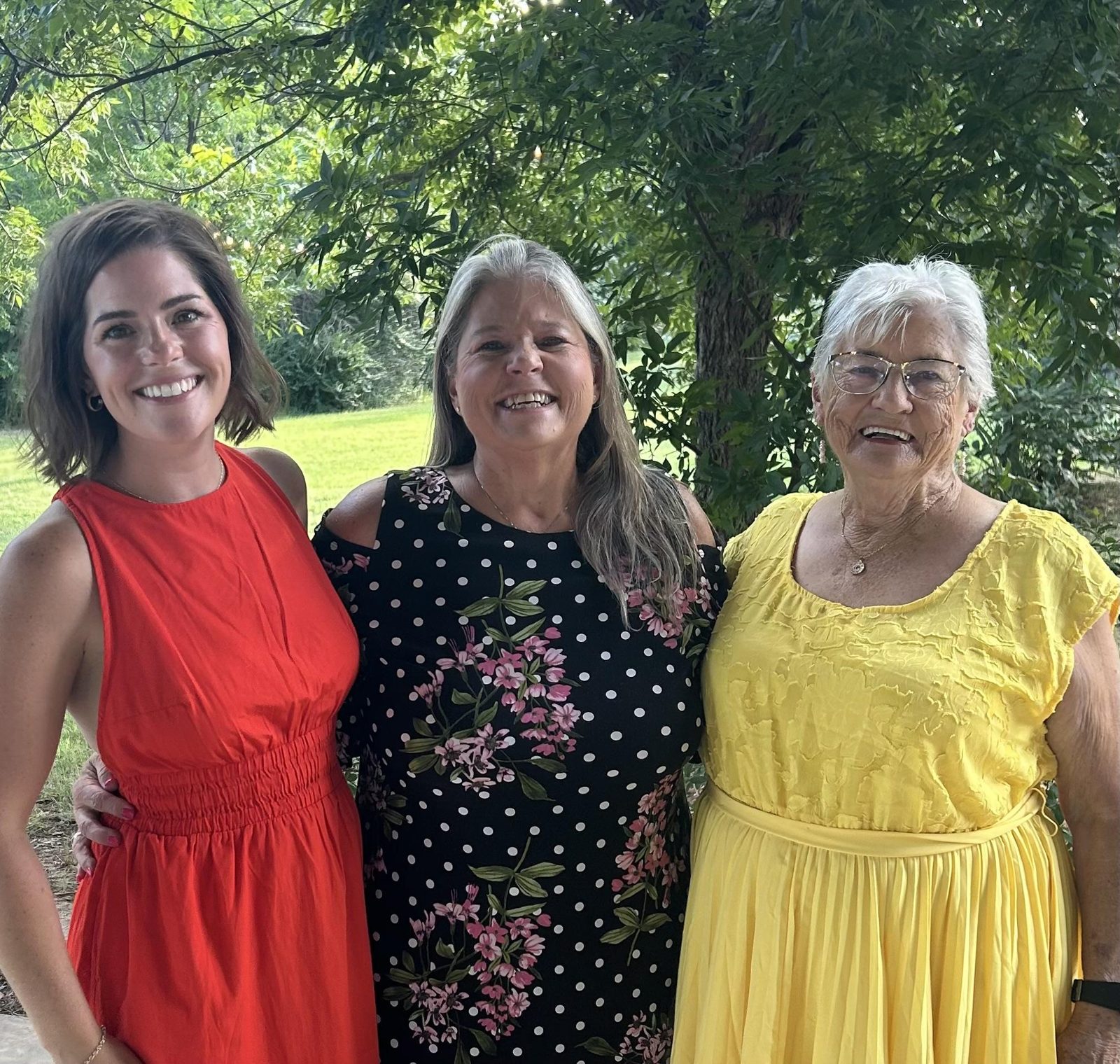 Amy in the garden with her mom and Granny